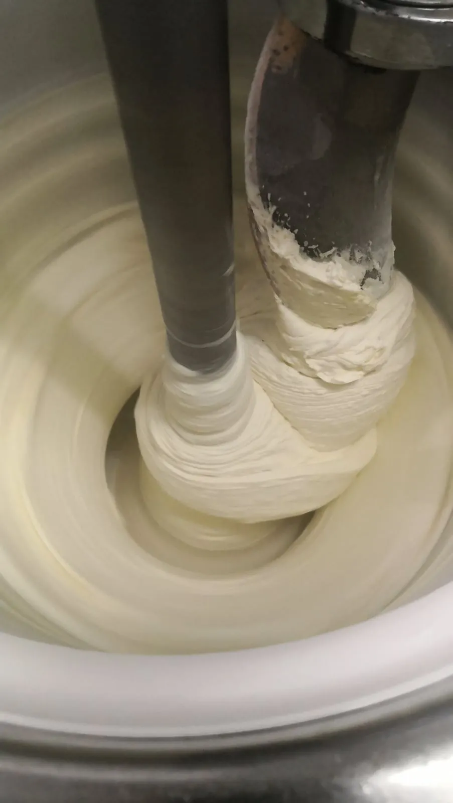 Fresh gelato coming out of the batch freezer